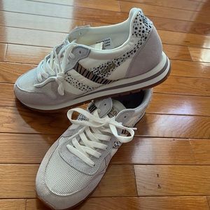 Ladies animal accent Sneakers! Brand new, never worn! The toe & heel is taupe.